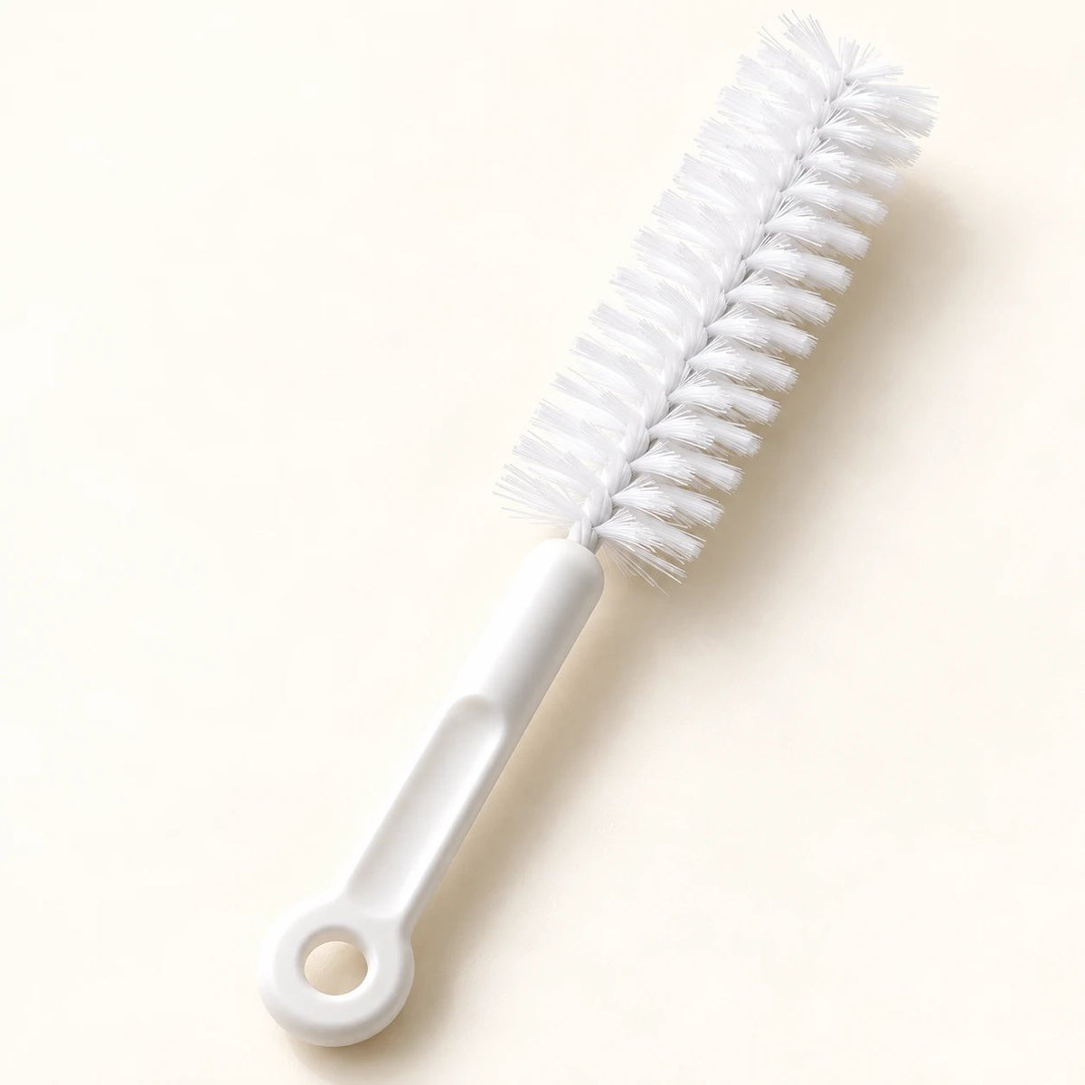 Brosse de nettoyage à manche blanc pour fontaine à chat